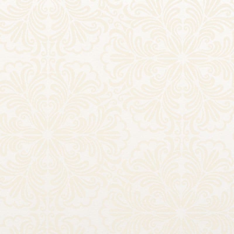 Decorative cream damask wallpaper — repeating stylized floral motifs — covering a wall; softly textured and subtly embossed; neutral interior lit by even, diffused light with no furniture visible.