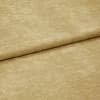 Beige plush, short-pile fabric folded across the frame, showing a neat horizontal fold; close-up view with soft, even lighting on a neutral background.