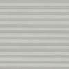 Light-gray pleated cellular blinds, lowered and fully closed, diffusing soft daylight; covering a window in a neutral, evenly lit interior with no outside view visible.