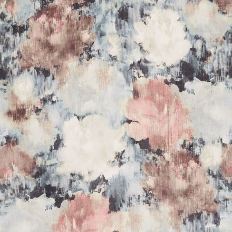 Textured fabric with abstract, watercolor-like floral blooms; soft vertical striations blur edges, creating mottled, cloudlike shapes. Muted pastel palette of blush, beige, blue and charcoal on flat surface.