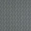 Navy-and-cream woven herringbone fabric, zigzag stripes of closely spaced lines, covering a flat surface and repeating uniformly, appearing as textured wallpaper under neutral light.