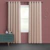 Beige grommet-top curtains hung from a metal rod, drawn slightly apart to filter bright daylight through a central window; muted rose walls, teal mid-century sideboard, circular wall sconce.
