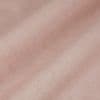 Sheer dusty-pink curtain with crosshatch linen texture, hanging in gentle vertical folds; soft, diffused light filters through, close-up view with no visible room beyond.