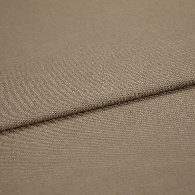 Beige woven fabric panel (textured) with a pronounced horizontal fold, folded over itself; close-up view showing fine weave, even neutral lighting and no visible surroundings.