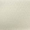 Embossed cream wallpaper with a repeating small leaf-like raised pattern covers a wall, casting subtle shadows in a softly lit, neutral-toned interior.