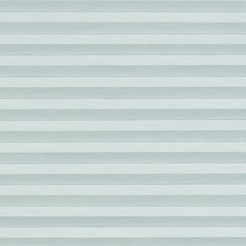 Horizontal pleated cellular shades fill the frame, evenly closed with thin horizontal bands; they diffuse soft, cool light, covering a window in a neutral, softly lit interior.