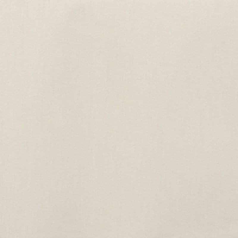 Beige fabric-like wall covering fills the frame, showing faint vertical grain; it evenly reflects soft light in a neutral, featureless interior.