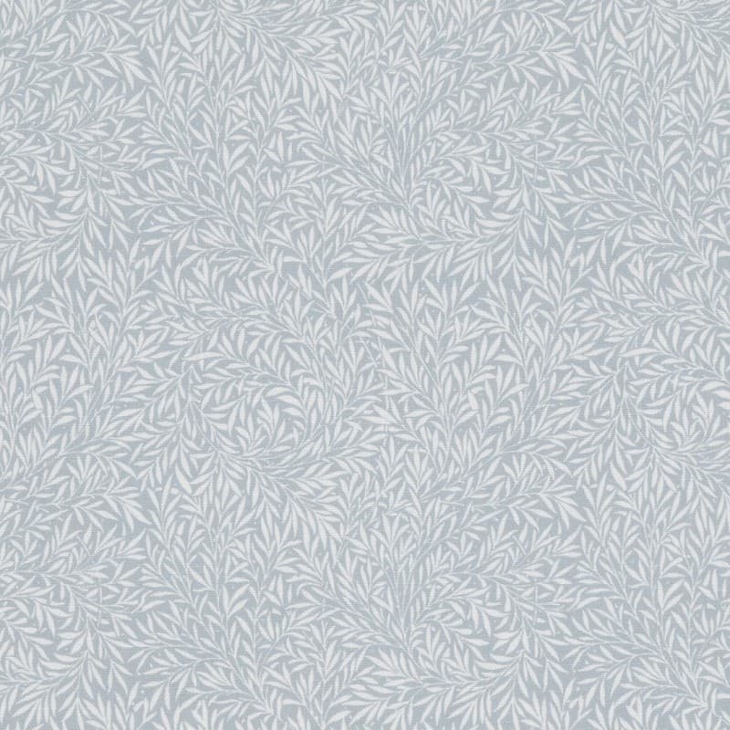 Printed wallpaper with a pale blue background and dense, swirling white leaf motif; covering a wall uniformly, producing a subtle textured, fabric-like appearance; decorative, calm interior surface.
