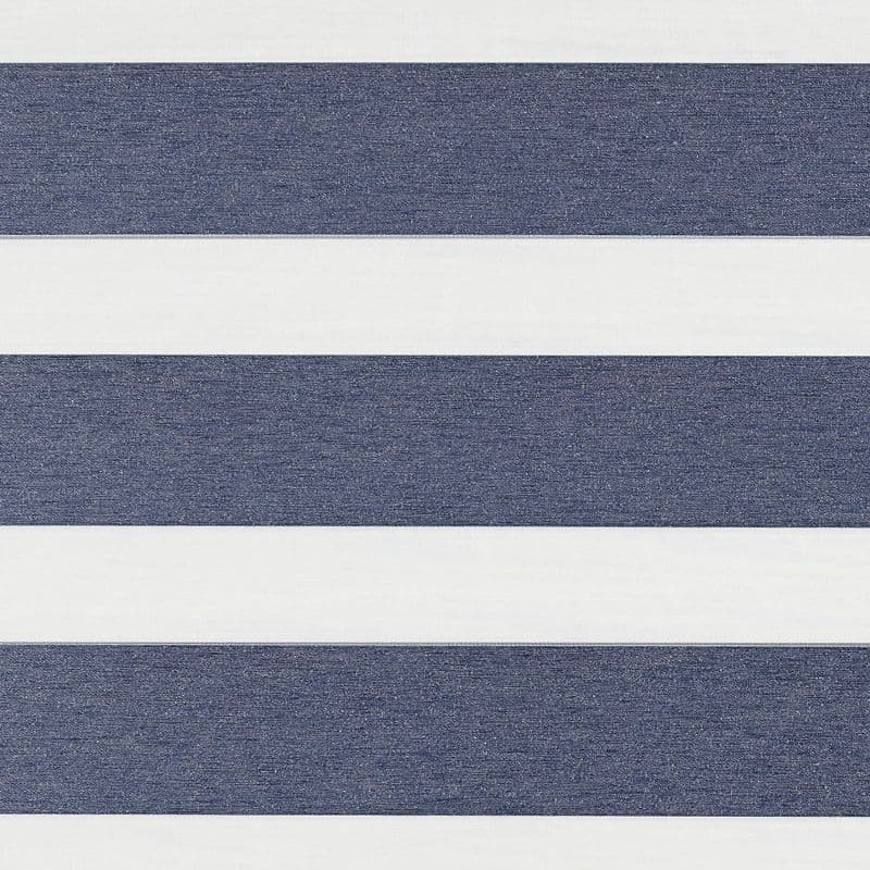 Horizontal striped fabric blind with wide navy-blue textured bands alternating with white translucent bands — positioned closed to block and filter light — fills a neutral, evenly lit interior.
