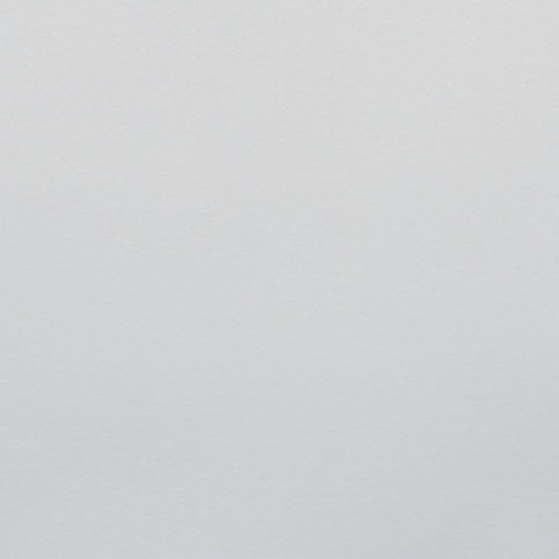 Light-gray textured wall occupying the frame, appearing blank and unadorned; evenly lit by soft, diffuse light with no visible furniture or other features.