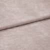 Plush blush-pink textured fabric, shown folded with one overlapping edge and visible nap, resting flat; close-up, evenly lit view emphasizing soft pile and subtle sheen.