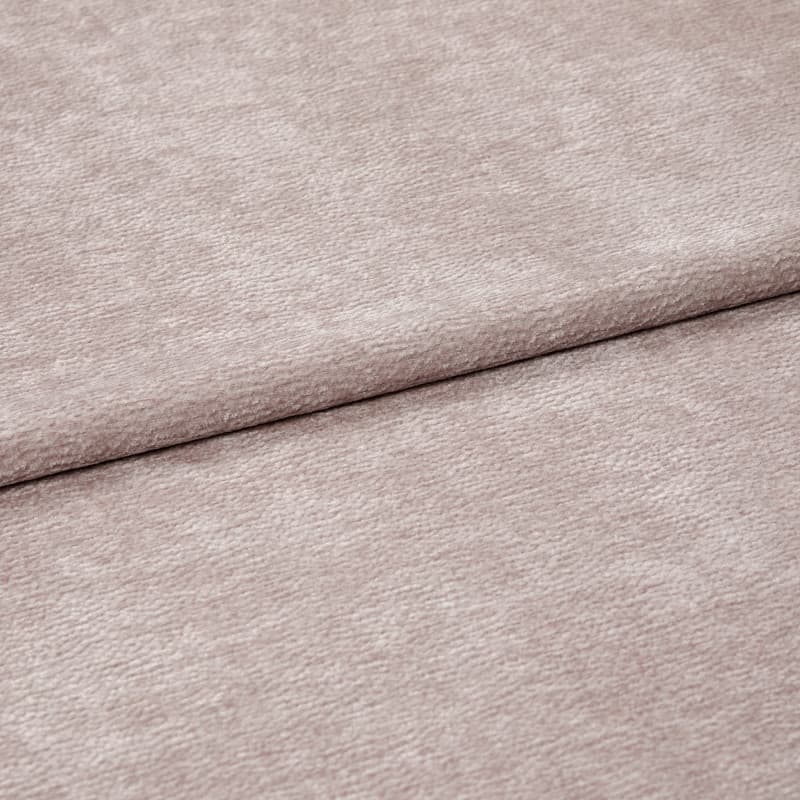 Plush blush-pink textured fabric, shown folded with one overlapping edge and visible nap, resting flat; close-up, evenly lit view emphasizing soft pile and subtle sheen.