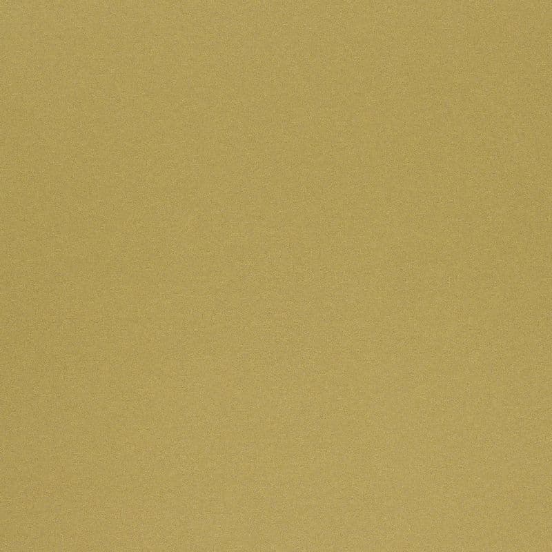 Golden-brown diagonal-twill fabric covering the entire frame, displaying fine woven texture; evenly lit, featureless setting with no windows or other objects.