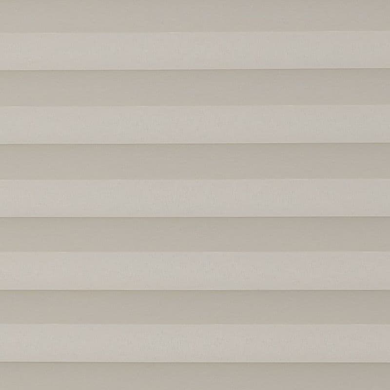 Horizontal beige pleated shades, fully closed with evenly spaced fabric folds, filtering diffuse light; interior setting with neutral tones and no visible view, producing a uniform, muted appearance.