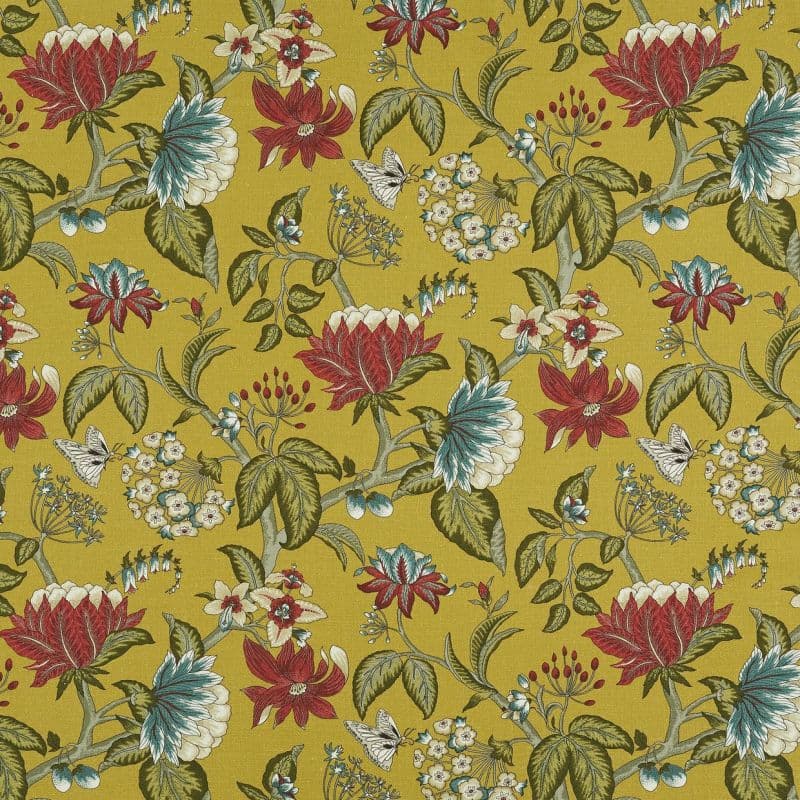 Mustard-yellow printed wallpaper patterned with stylized red, teal, and white blossoms, green leaves, and small butterflies; the repeating design covers the flat surface evenly, shown as a textile swatch.