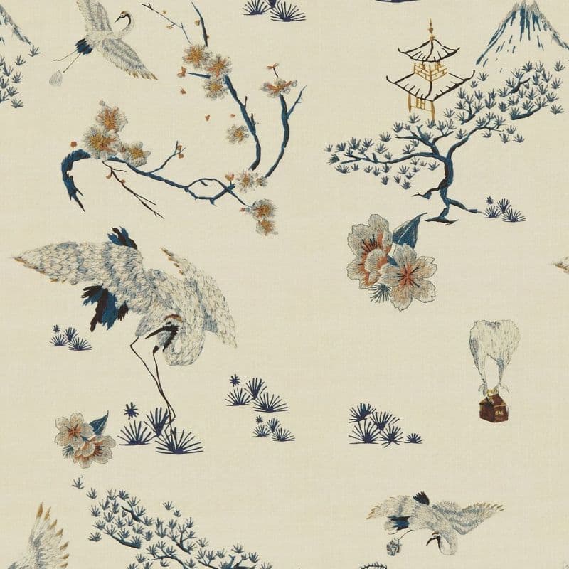 Patterned textile/wallpaper (cream) featuring embroidered-style cranes, blossoming branches, pine trees and a pagoda — cranes walking and flying across a repeating decorative motif in a soft, muted palette.