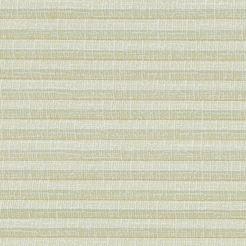 Cream pleated cellular blind with fine woven texture, fully closed, diffusing soft indoor light across a neutral wall in a calm interior.