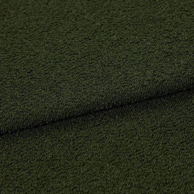 Dark olive‑green bouclé fabric, folded in a shallow horizontal overlap, showing dense looped texture; close-up studio view emphasizing a tactile, slightly shadowed surface.