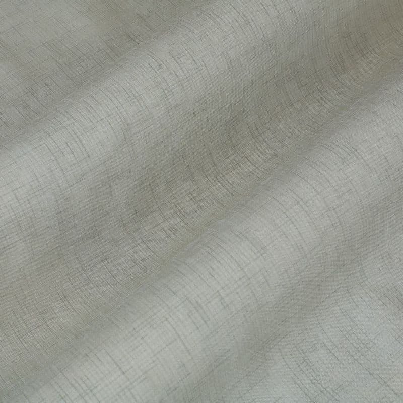 Light gray textured curtain fabric with fine crosshatch pattern, draped in soft vertical folds, gently diffusing light; close-up interior view emphasizing weave and subtle shading.