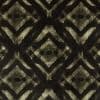 Dark textile with repeating diamond-and-chevron motif, watercolor-like black and olive strokes forming mirrored geometric shapes; displayed flat under even lighting, close-up view with no visible surroundings.