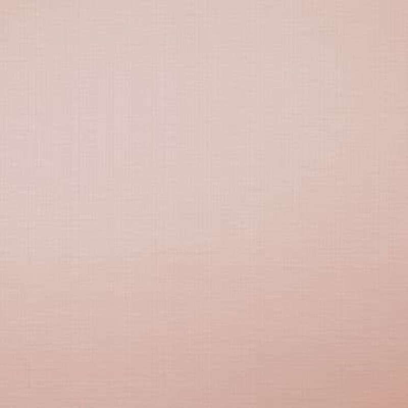 Textured rose‑pink wallpaper with a faint woven crosshatch pattern, lying flat and unornamented; it covers a wall surface, lit evenly by soft diffuse light with no other features visible.