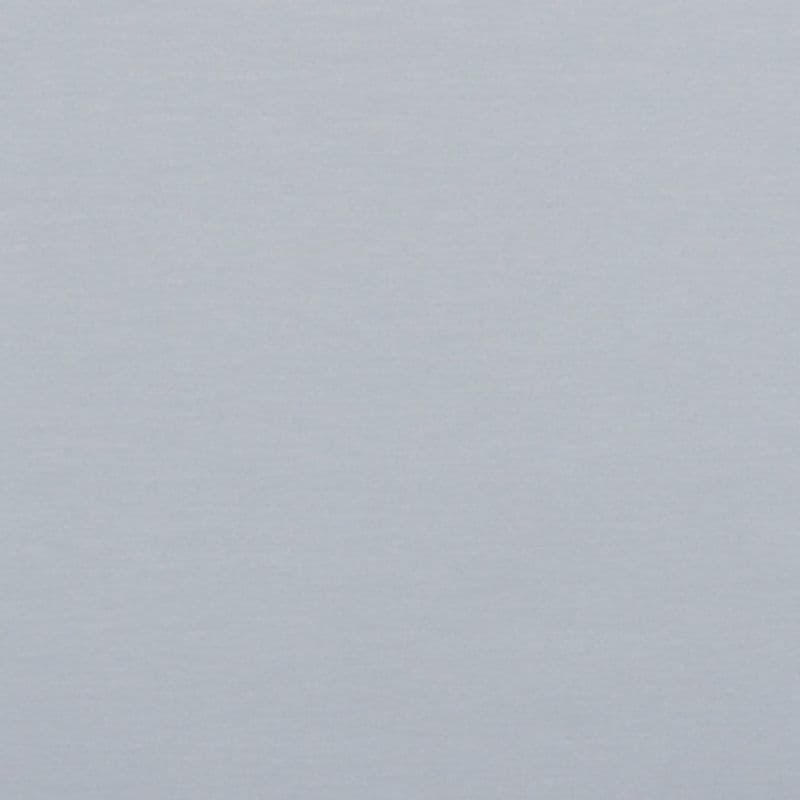 Pale blue‑gray textured surface (paper or painted wall) filling the entire frame, displaying subtle horizontal grain under even, diffuse lighting with no other visible features.