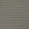 Horizontal corrugated metal roller shutter—narrow ridged slats spanning the frame—rolled fully down, closed; blocking light and view; plain gray surface suggesting a garage or storefront exterior in even daylight.