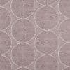 Wallpaper with overlapping concentric-circle pattern of tiny mauve dots forming large white-outlined circles; covering a flat wall surface, decorative geometric motif in soft, even lighting.