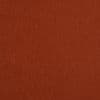 Rust-colored woven fabric panel covering the surface, lying flat and evenly lit, showing subtle crosshatch texture and uniform color across a plain backdrop.