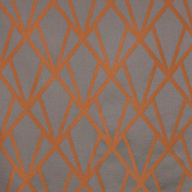 Grey wallcovering with bold orange geometric lattice of intersecting angular lines, forming repeating diamond shapes across a flat, evenly lit close-up surface.