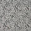 Decorative wallpaper with large stylized tropical leaves and small flowers, arranged in a dense repeating pattern; covering a flat surface, muted grayscale palette, evenly lit, no visible room elements.