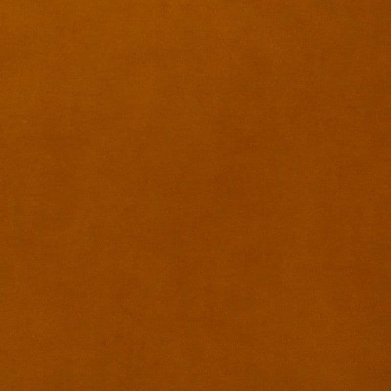 Orange-brown textured surface filling the frame — static and unbroken — evenly lit with slight graininess — close-up interior view with no discernible features or objects.