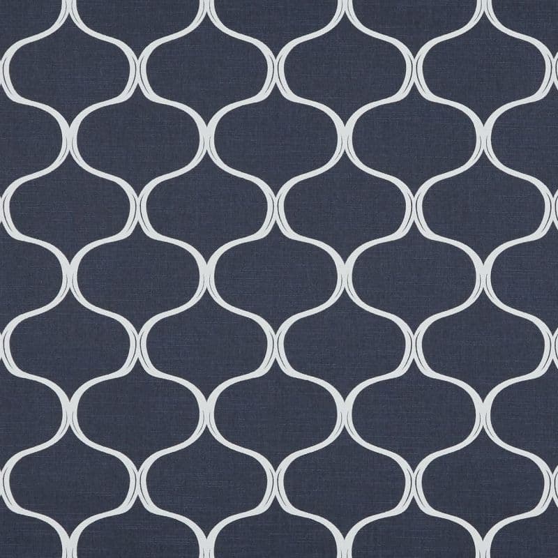 Navy wallpaper with white interlocking trellis/quatrefoil pattern; repeating curved outlines cover the surface; flat, evenly lit backdrop showing subtle linen-like texture.
