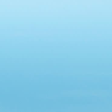 Plain light-blue gradient surface (wall or sky) — smooth, seamless color field, subtly darkening toward the bottom; evenly lit, minimal texture, occupying the entire frame with no discernible objects or horizon.