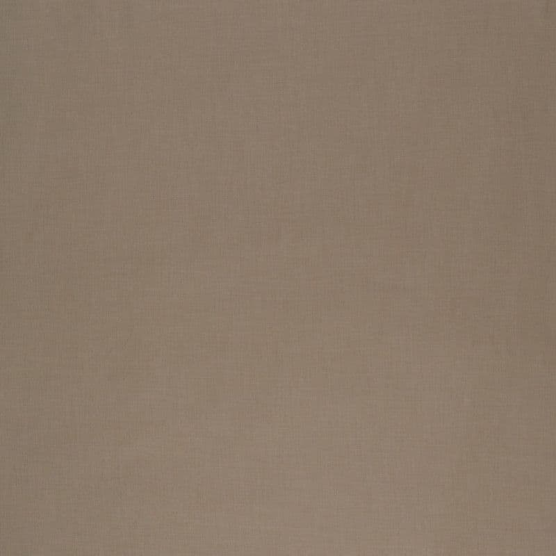 Tan woven linen curtain covers entire frame, hanging flat and closed, softly filtering light; neutral, evenly lit backdrop with subtle texture and no visible room features or objects.