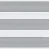 Dual-layer zebra roller blind across a window: alternating opaque white and narrow grey-striped sheer bands, aligned to form horizontal light-and-shade stripes, viewed close-up in a neutral interior setting.