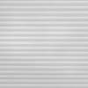 Light-gray pleated (cellular) blind covering the whole window frame, horizontal textured ribs; closed and filtering soft diffuse light; set in a neutral, evenly lit interior with no visible view.