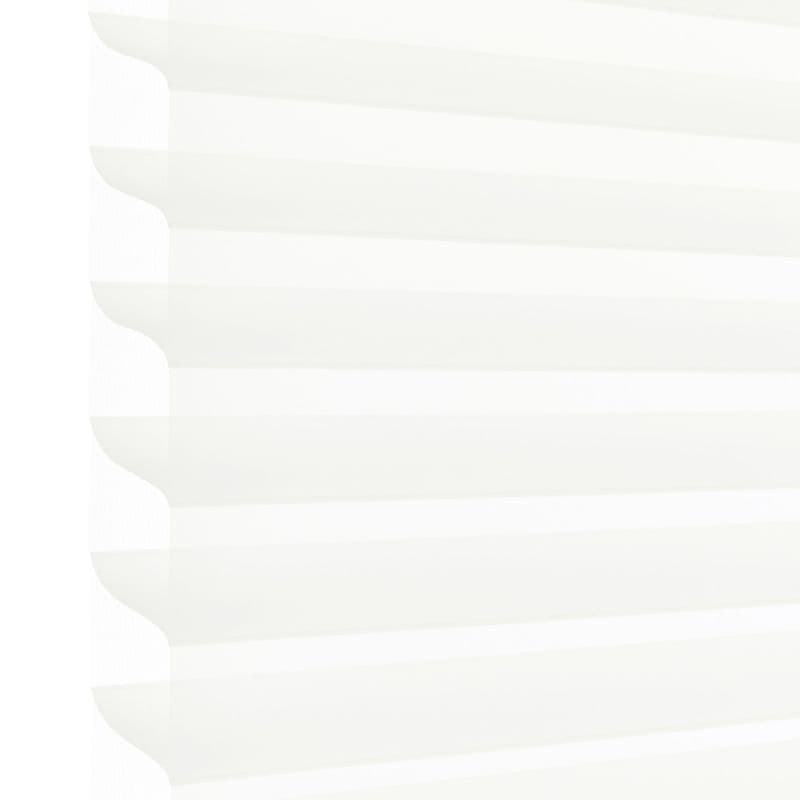 White pleated cellular blind with scalloped left edge, lowered and filtering soft daylight; occupies most of the frame, suggesting a bright interior with diffused light and no visible outside view.