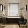 Horizontal venetian blinds covering a central bathroom window, fully lowered and closed, softly diffusing daylight; modern tub beneath, wooden vanity, striped pale walls, small shelf, chair and decorative vase.