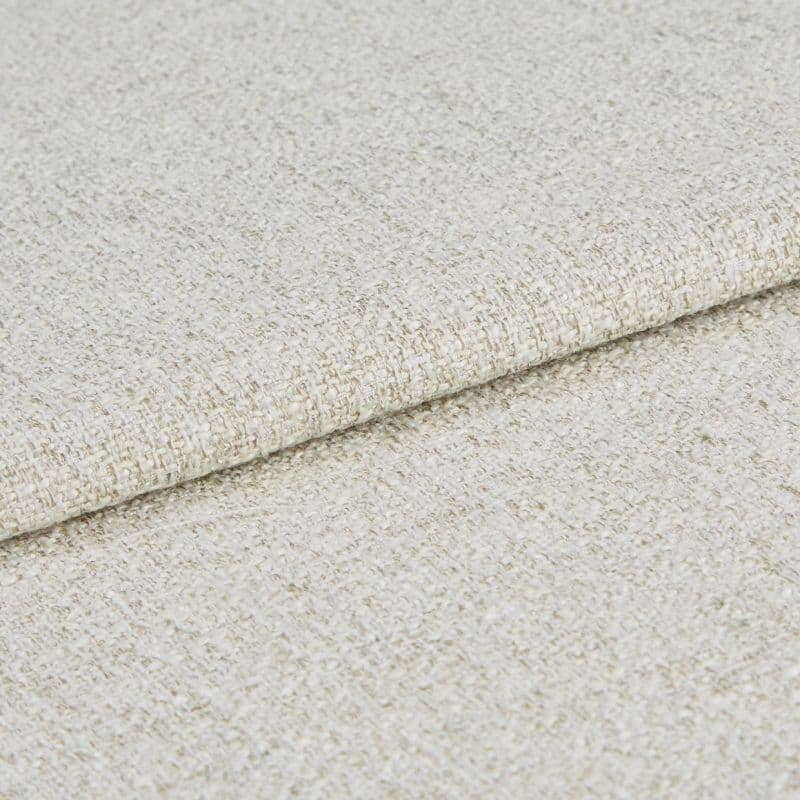 Beige woven fabric folded once, overlapping to show its edge; coarse boucle-like weave texture visible; close-up, even studio lighting on a neutral surface.